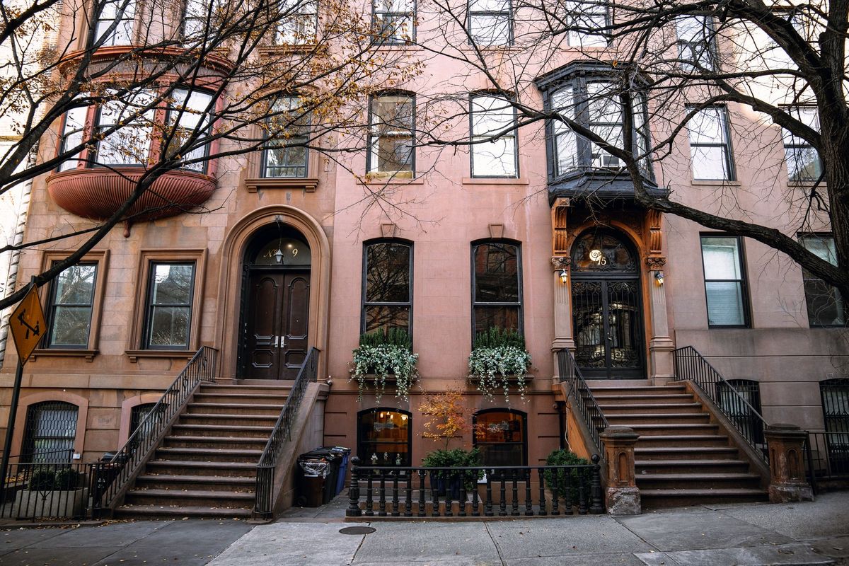 Brooklyn brownstones with stoops and bare autumn trees